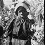 "We'se done all dis's Mornin'." [Girls with bale of cotton in the field.]