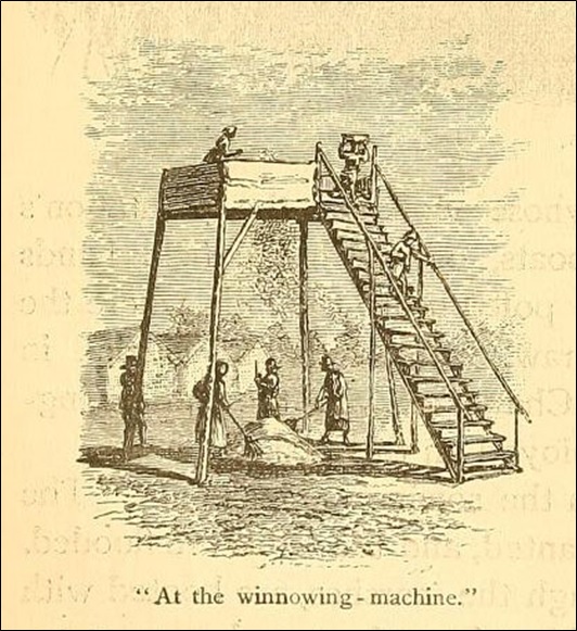 “At the winnowing-machine”