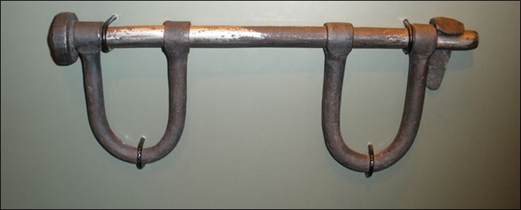 A reproduction of shackles used by traders to manage the men on board ships