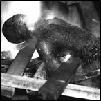 The Charred Corpse of Will Brown after Being Killed, Mutilated and Burned