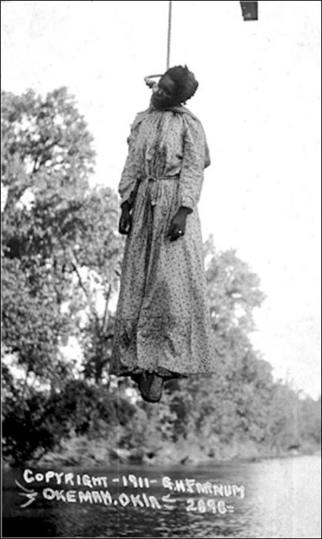 The barefoot corpse of lynched Laura Nelson. May 25, 1911