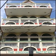 A building with a shop on the first floor