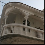 Wrap around balcony with arches