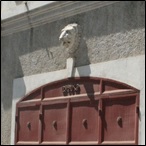 Haitian metal gate design with lion head sculpture