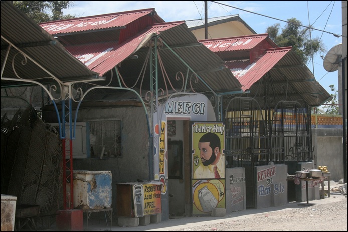 Shops with metal roofs and ironwork designs