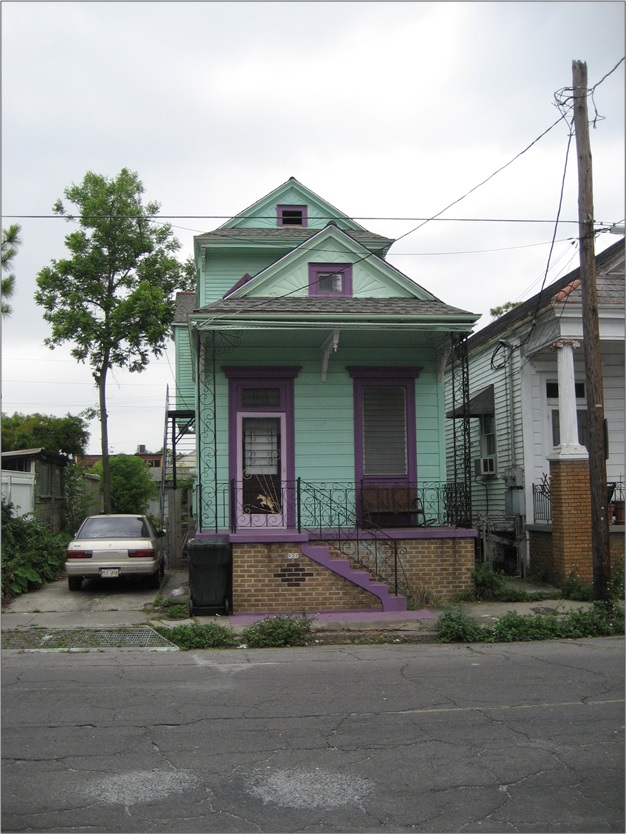 Raised "shotgun" style house in formerly flooded Mid City neighborhood